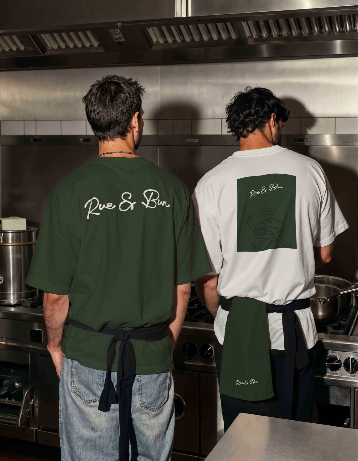 Rue & Bun staff tees photographed in a kitchen